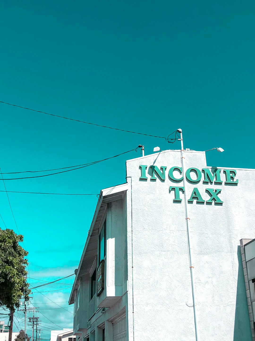 white-and-blue-incom-tax-building-u3cfxogivw0